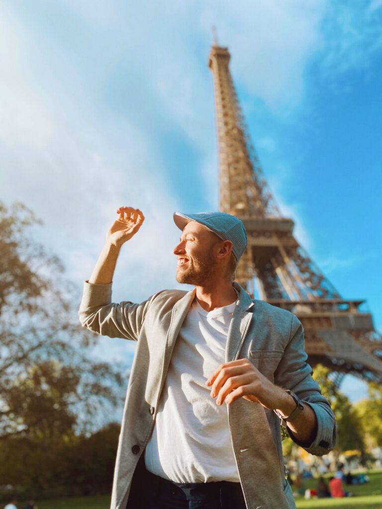 Traveler watching the Eiffel Tower's nightly light show